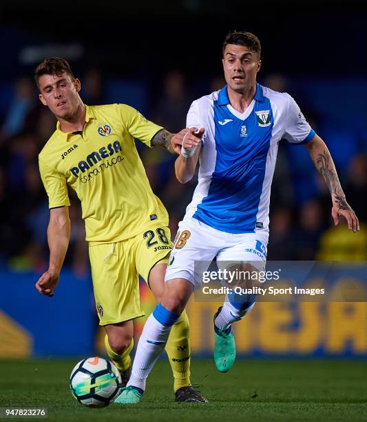 Daniel Raba of Villarreal competes for the ball with Pablo Insua Blanco of Leganes during the La Liga match between Villarreal and Leganes at Estadio...