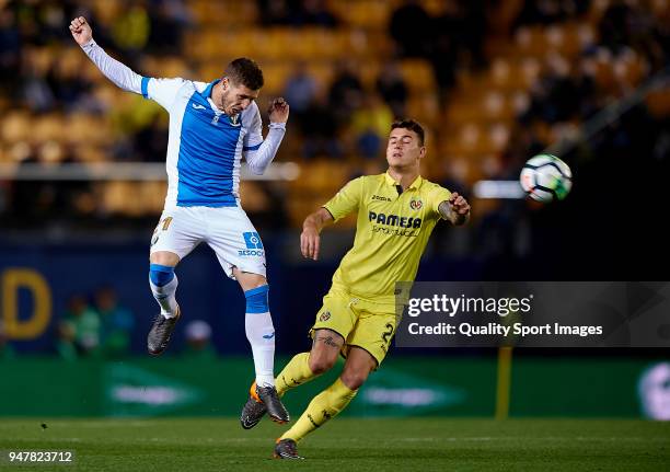 Daniel Raba of Villarreal competes for the ball with Ruben Perez of Leganes during the La Liga match between Villarreal and Leganes at Estadio de la...