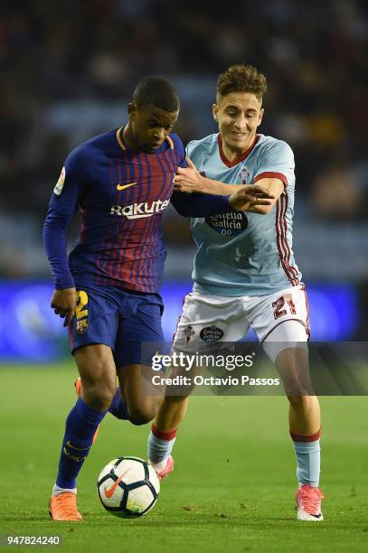 Emre Mor of Celta de Vigo competes fo the ball with Nelson Semedo of Barcelona during the La Liga match between Celta de Vigo and Barcelona at...