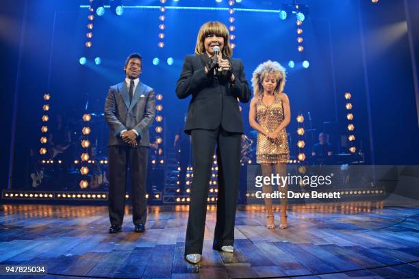 Tina Turner speaks as cast members Kobna Holdbrook-Smith and Adrienne Warren look on at the curtain call during the press night performance of "Tina:...