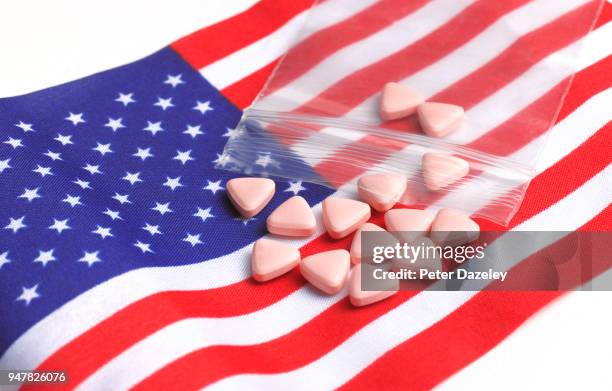 illegal recreational drugs on american flag - mdma stock pictures, royalty-free photos & images