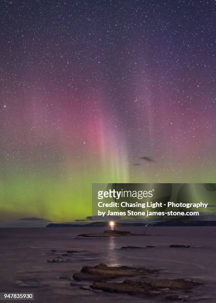 aurora australis over the iron pot lighthouse, tasmania - aurora australis stock pictures, royalty-free photos & images