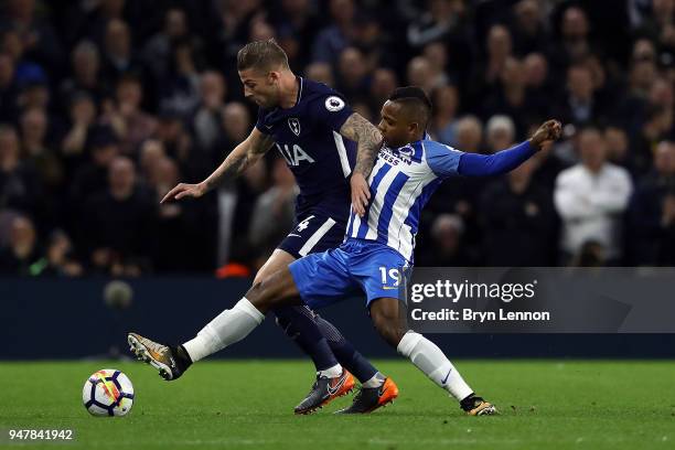 Jose Izquierdo of Brighton & Hove Albion tackles Toby Alderweireld of Tottenham Hoptspur during the Premier League match between Brighton and Hove...