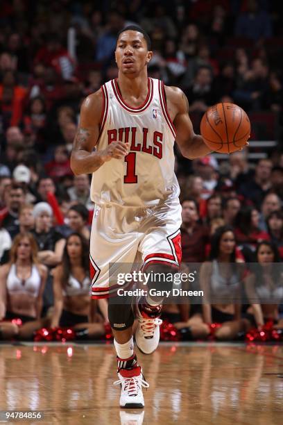 Derrick Rose of the Chicago Bulls brings the ball upcourt against the Toronto Raptors during the game on December 5, 2009 at the United Center in...