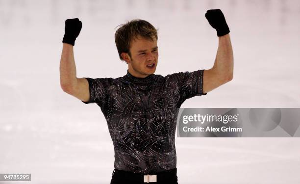 New champion Stefan Lindemann celebrates after his performance at the men's free skating during the German Figure Skating Championships 2010 at the...