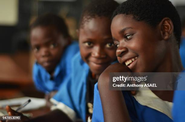 Malawi, Lilongwe, Chambwe Primary School, Pupils in the classroom about 40 kilometres west of Lilongwe, learning comfortably on desks. Through...