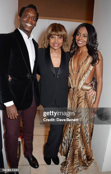 Tina Turner poses with cast members Kobna Holdbrook-Smith and Adrienne Warren at the press night after party for "Tina: The Tina Turner Musical" at...