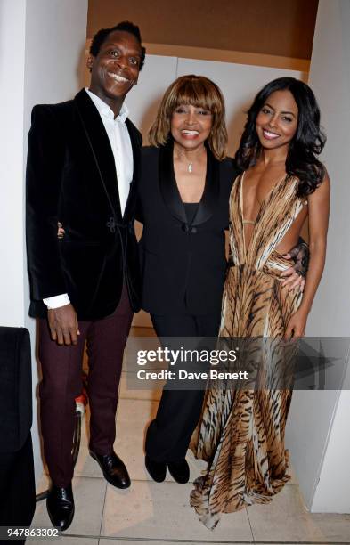 Tina Turner poses with cast members Kobna Holdbrook-Smith and Adrienne Warren at the press night after party for "Tina: The Tina Turner Musical" at...
