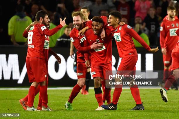 Les Herbiers' players celebrate after winning the French cup semi-final match between Les Herbiers and Chambly at The Beaujoire Stadium in Nantes on...