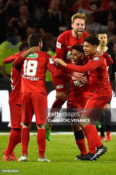 Les Herbiers' players celebrate after winning the French cup semi-final match between Les Herbiers and Chambly at The Beaujoire Stadium in Nantes on...