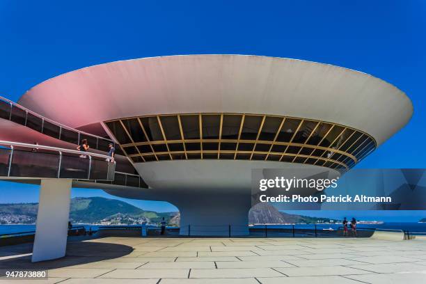 museum of contemporary art rounded building in the city of niterói located across the bay of rio de janeiro, brazil - the niteroi contemporary art museum stock pictures, royalty-free photos & images