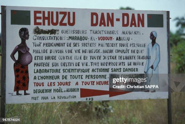 Pancarte pour la consultation d'un marabout en novembre 1988, au Bénin.