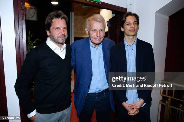 Patrick Poivre d'Arvor standing between his son Arnaud Poivre d'Arvor and his grandson pose after the "Patrick et ses Fantomes" Theater Play at...