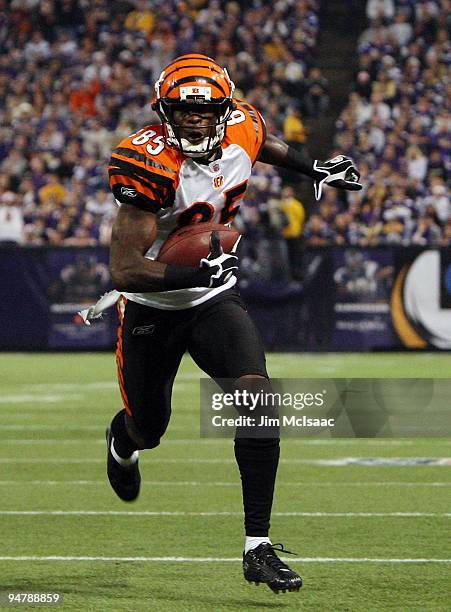 Chad Ochocinco of the Cincinnati Bengals runs in a touchdown against the Minnesota Vikings on December 13, 2009 at Hubert H. Humphrey Metrodome in...