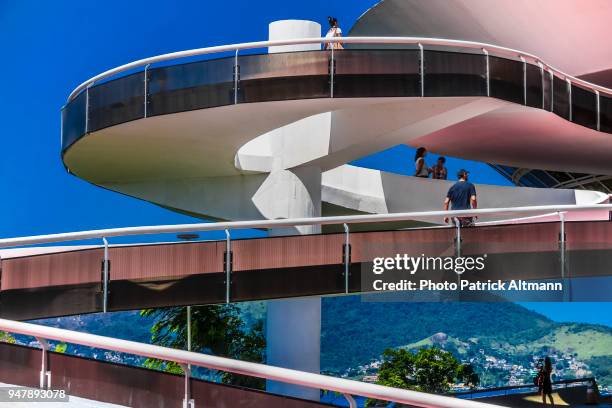 curved ramps to access the museum of contemporary art rounded building in the city of niterói located across the bay of rio de janeiro, brazil - the niteroi contemporary art museum stock pictures, royalty-free photos & images