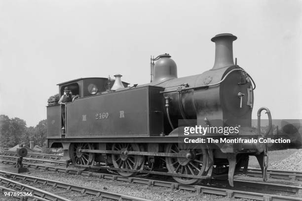 Train driver on Midland Railway Number 2460, Belpaire Firebox locomotive 2441 Class, introduced by Samuel Johnson in 1899, England circa 1900.