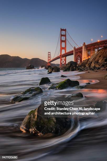 the tide of golden gate bridge - baker beach stock pictures, royalty-free photos & images