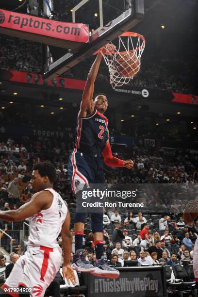 Otto Porter Jr. #22 of the Washington Wizards dunks against the Toronto Raptors in Game Two of Round One of the 2018 NBA Playoffs on April 17, 2018...