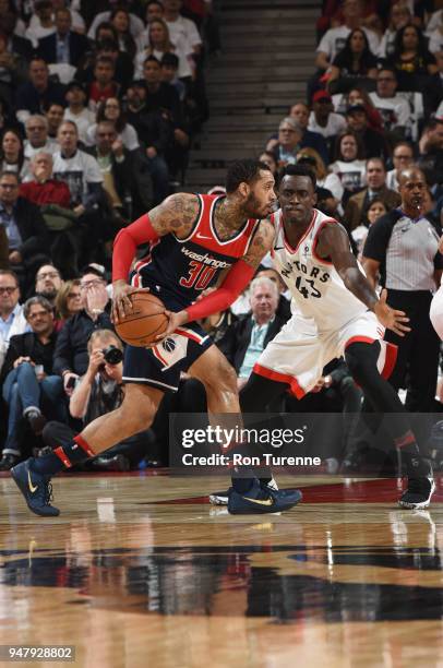 Mike Scott of the Washington Wizards handles the ball against the Toronto Raptors in Game Two of Round One of the 2018 NBA Playoffs on April 17, 2018...