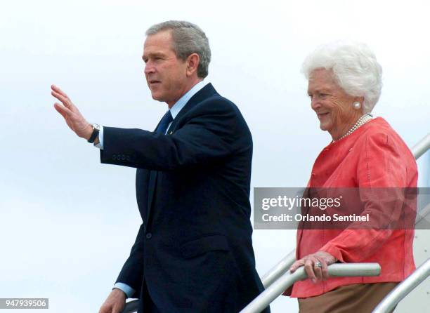 In a March 2005 file image, President Bush arrives with mom Barbara Bush in Orlando, Fla.