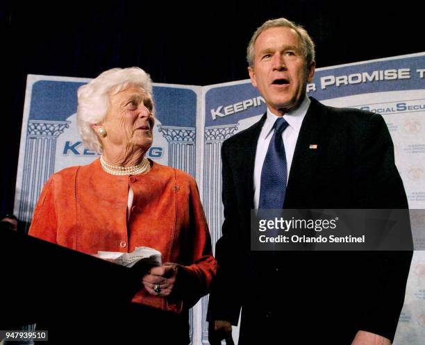 In a March 2005 file image, President George Bush with mom Barbara Bush in Orlando, Fla.