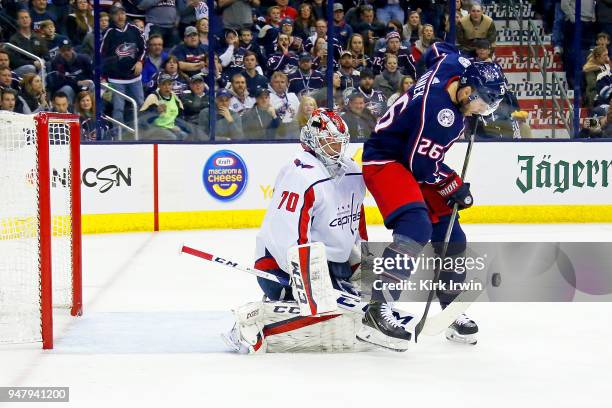 Braden Holtby of the Washington Capitals blocks a shot by Thomas Vanek of the Columbus Blue Jackets during the second period in Game Three of the...