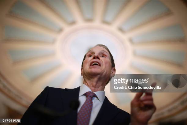 Sen. Ron Wyden talks with reporters following the weekly Democratic policy luncheon at the U.S. Capitol April 17, 2018 in Washington, DC. Noting that...