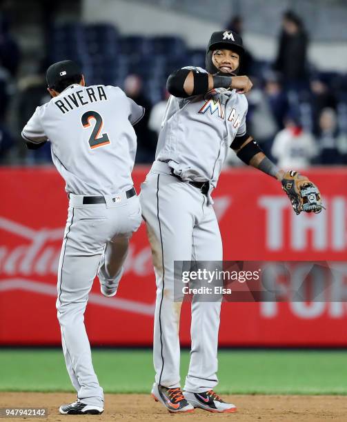 Yadiel Rivera and Starlin Castro of the Miami Marlins celebrate the 9-1 win over the New York Yankees at Yankee Stadium on April 17, 2018 in the...