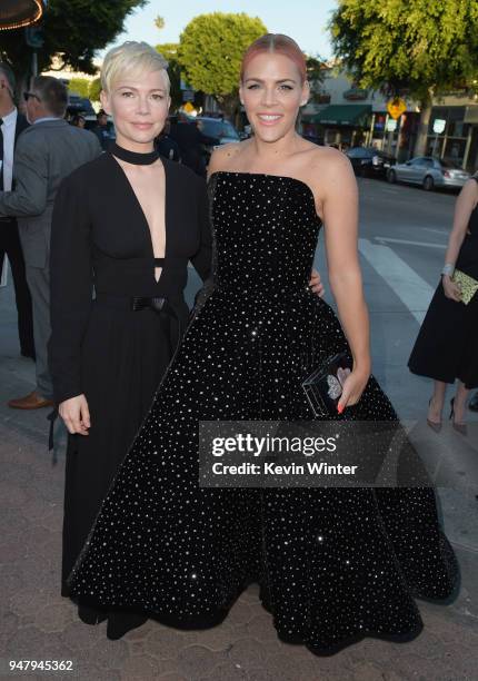 Michelle Williams and Busy Philipps attend the premiere of STX Films' "I Feel Pretty" at Westwood Village Theatre on April 17, 2018 in Westwood,...