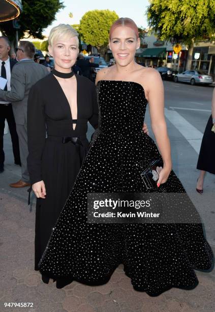Michelle Williams and Busy Philipps attend the premiere of STX Films' "I Feel Pretty" at Westwood Village Theatre on April 17, 2018 in Westwood,...