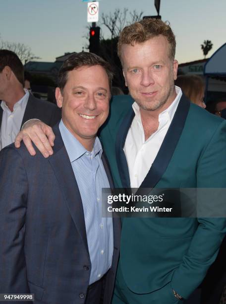 Chairman of STXfilms Adam Fogelson and producer McG attend the premiere of STX Films' "I Feel Pretty" at Westwood Village Theatre on April 17, 2018...