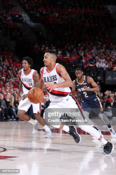 McCollum of the Portland Trail Blazers handles the ball against the New Orleans Pelicans in Game Two of Round One of the 2018 NBA Playoffs on April...