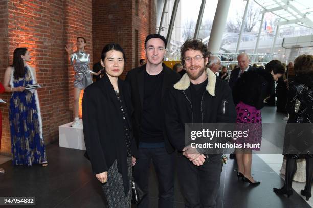 Brian "KAWS" Donnelly, wife Julia Chiang and Dustin Yellin attend the Eighth Annual Brooklyn Artists Ball at The Brooklyn Museum on April 17, 2018 in...