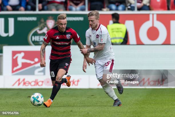 Sonny Kittel of Ingolstadt and Marvin Stefaniak of Nuernberg battle for the ball during the Second Bundesliga match between FC Ingolstadt 04 and 1....