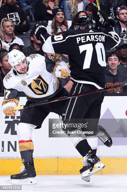 Shea Theodore of the Vegas Golden Knights battles against Tanner Pearson of the Los Angeles Kings in Game Four of the Western Conference First Round...