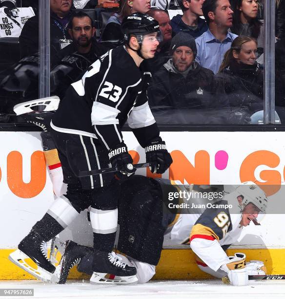 Dustin Brown of the Los Angeles Kings battles against Tomas Nosek of the Vegas Golden Knights in Game Four of the Western Conference First Round...