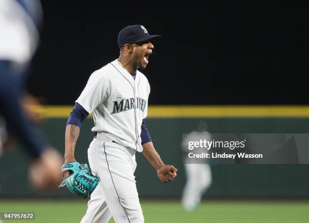 Ariel Miranda of the Seattle Mariners celebrates getting out of a bases-loaded jam in the second inning against the Houston Astros at Safeco Field on...