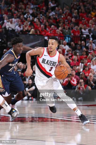 McCollum of the Portland Trail Blazers handles the ball against the New Orleans Pelicans in Game Two of Round One of the 2018 NBA Playoffs on April...