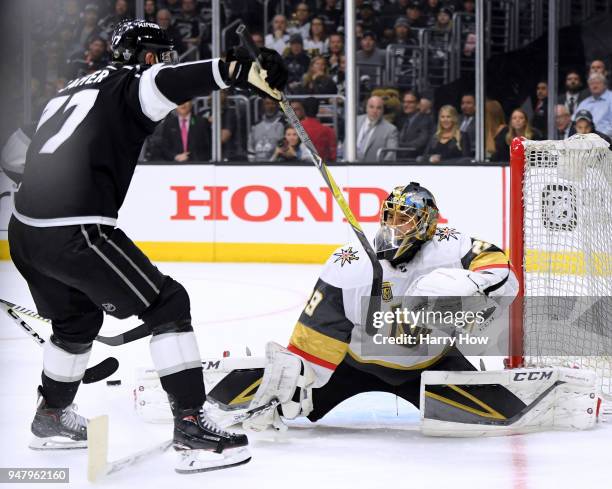 Marc-Andre Fleury of the Vegas Golden Knights makes a save on Jeff Carter of the Los Angeles Kings during the second period in Game Four of the...