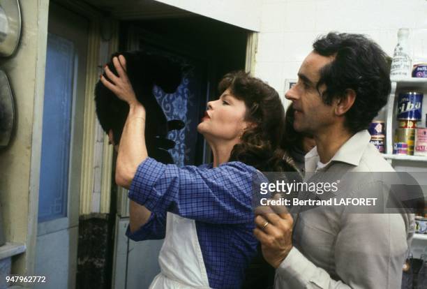 Actress Catherine Allegret and Edouard Molinaro on set of TV movie Au Bon Beurre adapted from the book of Jean Dutourd in October 1980 in France.