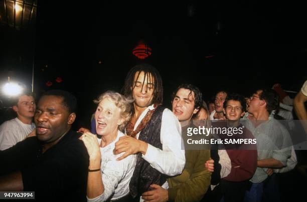 Marie Claire Noah and son Yannick during party after victory of French tennis team in the Davis Cup against United States, on December 1, 1991.