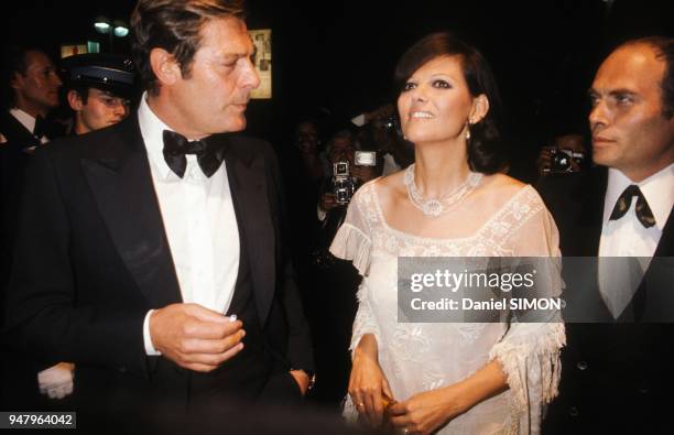 Marcello Mastroianni with Claudia Cardinale and Pasquale Squitieri at Cannes Film Festival in May 1976 in Cannes, France.