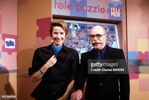 Daniele Gilbert and Jean Paul Rouland on set of television quiz show in April 1987 in Paris, France.
