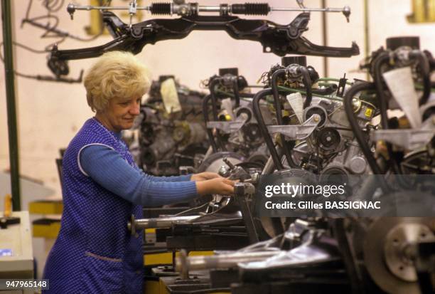 Daily life in Czechoslovakia in 1990, engine assembly of Skoda Favorit 136 in February 1990 in Mlada Boleslav, Czech Republic.