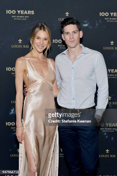 Britt Maren and Derek Orrell attend LOUIS XIII Cognac Presents "100 Years" - The Song We'll Only Hear #IfWeCare - by Pharrell Williams at Goya...