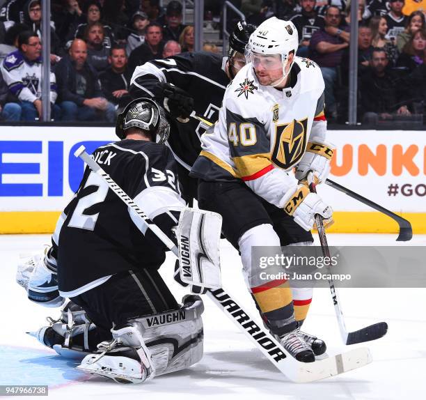 Ryan Carpenter of the Vegas Golden Knights battles in front of the net against Jonathan Quick of the Los Angeles Kings in Game Four of the Western...