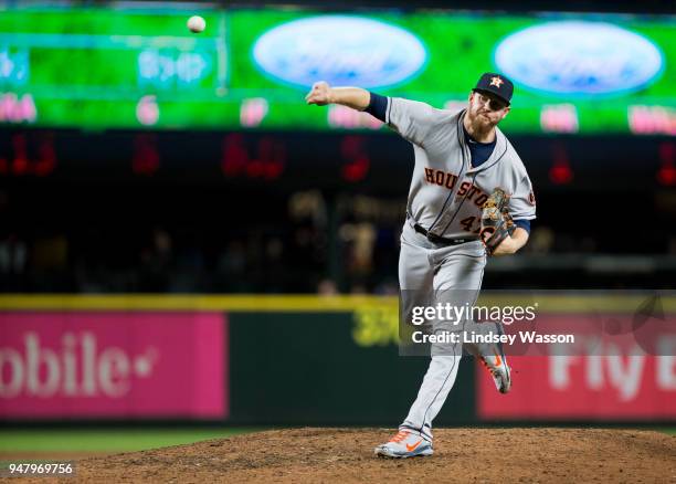 Chris Devenski of the Houston Astros pitches against the Seattle Mariners in the ninth inning at Safeco Field on April 17, 2018 in Seattle,...