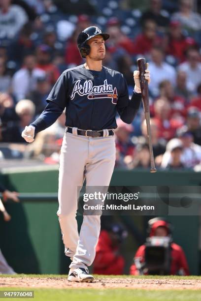 Ryan Flaherty of the Atlanta Braves looks on after a pitch during a baseball game against the Washington Nationals at Nationals Park on April 11,...