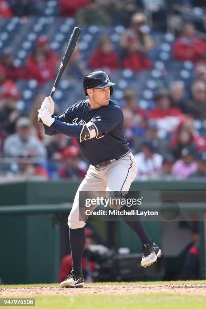 Peter Bourjos of the Atlanta Braves prepares for a pitch during a baseball game against the Washington Nationals at Nationals Park on April 11, 2018...