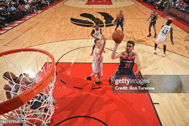 Tomas Satoransky of the Washington Wizards shoots the ball against the Toronto Raptors in Game One of Round One of the 2018 NBA Playoffs on April 14,...